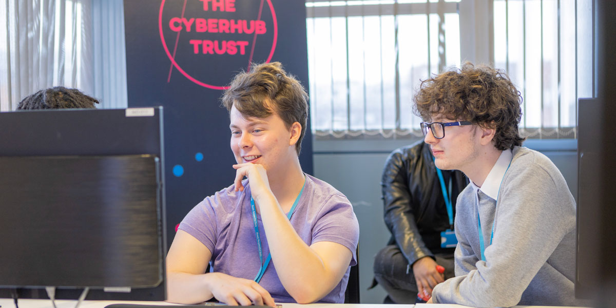 Two students sit at a computer in the new Security Operations Centre at Birmingham Metropolitan College